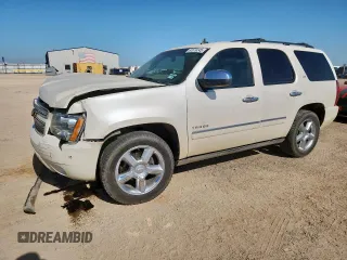 2013 Chevrolet Tahoe LTZ with VIN 1GNSCCE05DR110058, listed as a Copart auction lot 61679245 with 230,594 mi miles and Salvage title. Bid and sale history available at DreamBid. Image 1.