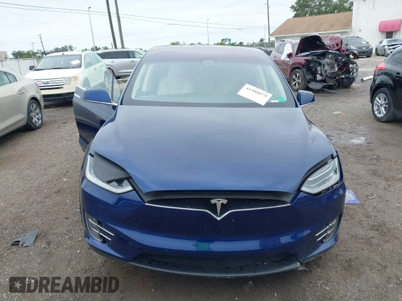 2018 Tesla Model X 75D with VIN 5YJXCAE2XJF111180, listed as a IAAI auction lot 41988079 with 114,593 mi miles and . Bid and sale history available at DreamBid. Image 12.