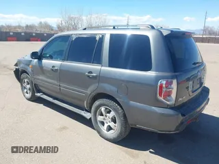 2007 Honda Pilot EX-L with VIN 2HKYF185X7H511879, listed as a IAAI auction lot 41872915 with 232,543 mi miles. Bid and sale history available at carsss.com. Image 3.