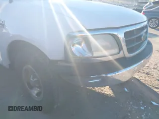 2001 Ford F-150 XL с VIN 1FTRX17W61KF65488, выставлен на аукционе IAAI как лот 40807535 с пробегом 298 274 миль миль и . История ставок и продаж доступна на DreamBid. Изображение 6.
