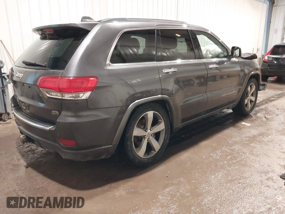 2015 Jeep Grand Cherokee Overland z VIN 1C4RJFCG1FC663469, wystawiony jako IAAI lot #41666113 z przebiegiem 140 159 mil mil oraz . Historia ofert i sprzedaży dostępna na DreamBid. Obrazek 4.