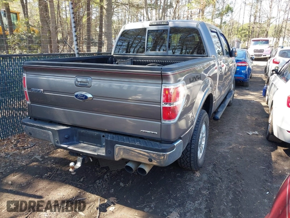 2014 Ford F-150 XL with VIN 1FTFW1EF9EKF61918, listed as a IAAI auction lot 41864650 with 217,839 mi miles. Bid and sale history available at carsss.com. Image 4.