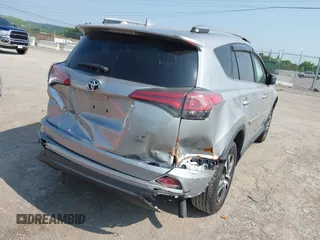 2017 Toyota RAV4 LE z VIN 2T3BFREVXHW641518, wystawiony jako IAAI lot #42306929 z przebiegiem 79 896 mil mil oraz . Historia ofert i sprzedaży dostępna na DreamBid. Obrazek 4.
