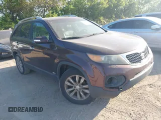 2011 Kia Sorento EX with VIN 5XYKUDA26BG059278, listed as a IAAI auction lot 42236023 with 197,740 mi miles and . Bid and sale history available at DreamBid. Image 1.