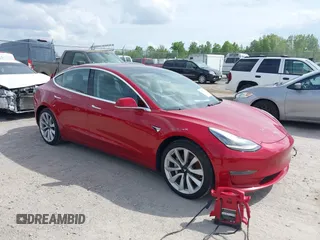 2018 Tesla Model 3 Long Range Battery with VIN 5YJ3E1EA8JF031683, listed as a IAAI auction lot 39275313 with 136,939 mi miles and . Bid and sale history available at DreamBid. Image 1.