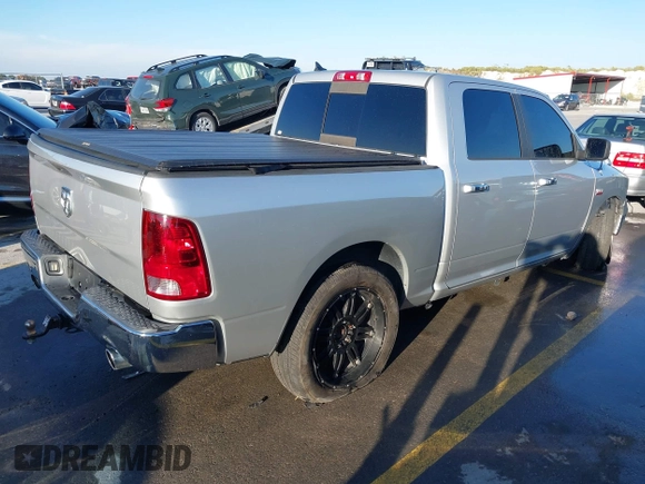2014 Ram 1500 Big Horn with VIN 1C6RR6LT1ES180291, listed as a IAAI auction lot 40962366 with 131,763 mi miles and . Bid and sale history available at DreamBid. Image 4.