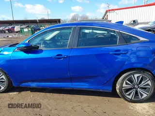 2017 Honda Civic EX-T with VIN 19XFC1E33HE028257, listed as a IAAI auction lot 41395356 with 51,154 mi miles and . Bid and sale history available at DreamBid. Image 14.