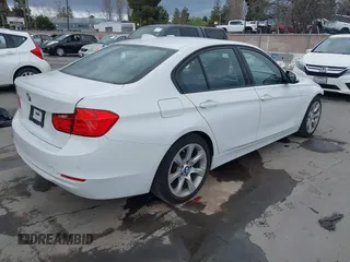 2015 BMW 3 Series 320i with VIN WBA3B1G52FNT06107, listed as a IAAI auction lot 41777304 with 85,832 mi miles. Bid and sale history available at carsss.com. Image 4.