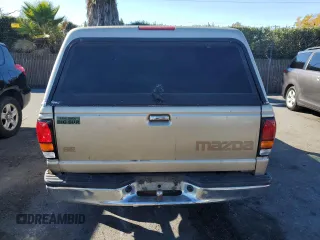 1999 Mazda B-Series Truck SX z VIN 4F4YR12C1XTM39102, wystawiony jako Copart lot #83462634 z przebiegiem 241 380 mil mil oraz Szkoda całkowita • Salvage title. Historia ofert i sprzedaży dostępna na DreamBid. Obrazek 6.