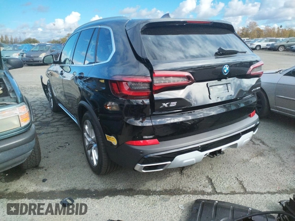 2022 BMW X5 xDrive45e with VIN 5UXTA6C01N9M84108, listed as a Copart auction lot 65150782 with 5,977 mi miles. Bid and sale history available at carsss.com. Image 3.