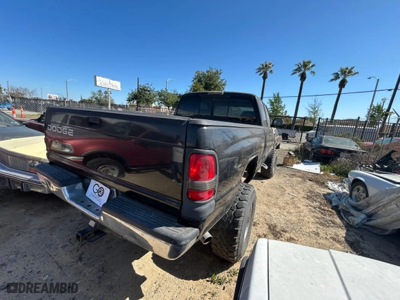 2001 Dodge Ram 1500 with VIN 1B7HC13Y11J562437, listed as a Copart auction lot 52826525 with 202,170 mi miles and Clean Title. Bid and sale history available at carsss.com. Image 4.