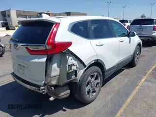 2019 Honda CR-V EX with VIN 5J6RW1H54KA008959, listed as a IAAI auction lot 41966044 with 168,797 mi miles. Bid and sale history available at carsss.com. Image 4.