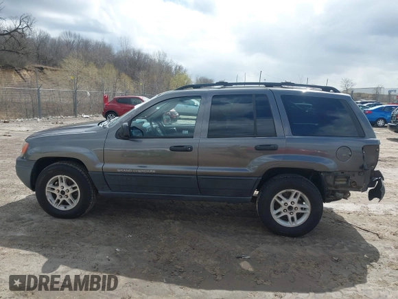 2004 Jeep Grand Cherokee Laredo z VIN 1J4GW48SX4C213322, wystawiony jako IAAI lot #41969362 z przebiegiem 273 876 mil mil oraz . Historia ofert i sprzedaży dostępna na DreamBid. Obrazek 14.
