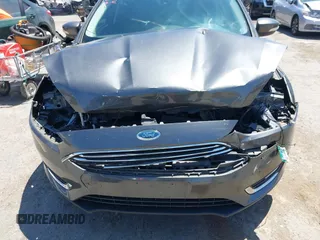 2018 Ford Focus Titanium with VIN 1FADP3N28JL232120, listed as a IAAI auction lot 42544070 with 28,661 mi miles and . Bid and sale history available at DreamBid. Image 6.