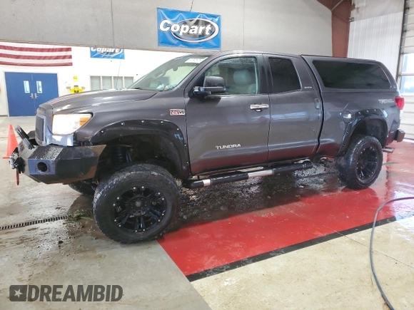 2011 Toyota Tundra 4WD Truck LTD with VIN 5TFBY5F15BX196980, listed as a Copart auction lot 51797675 with 124,080 mi miles and Salvage Title. Bid and sale history available at carsss.com. Image 1.