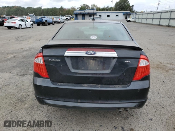 2012 Ford Fusion SEL with VIN 3FAHP0JA1CR203415, listed as a Copart auction lot 41707235 with 326,401 mi miles and Salvage Title. Bid and sale history available at carsss.com. Image 6.