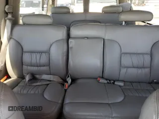 1999 Chevrolet Suburban with VIN 3GNEC16R0XG164600, listed as a Copart auction lot 49516445 with 105,747 mi miles and Salvage Title. Bid and sale history available at carsss.com. Image 10.