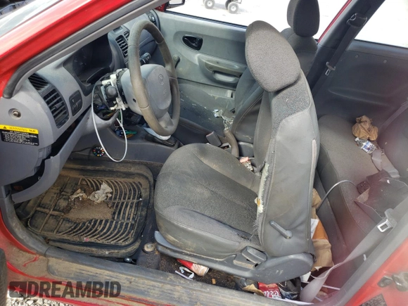 2003 Hyundai Accent with VIN KMHCF35C33U255489, listed as a Copart auction lot 75490604 with 219,457 mi miles and Salvage Title. Bid and sale history available at carsss.com. Image 7.