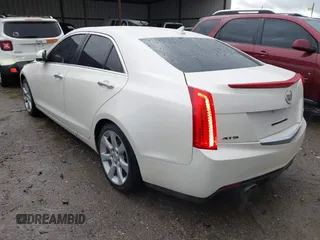 2013 Cadillac ATS z VIN 1G6AA5RX9D0156125, wystawiony jako IAAI lot #41964124 z przebiegiem 139 869 mil mil oraz . Historia ofert i sprzedaży dostępna na DreamBid. Obrazek 3.