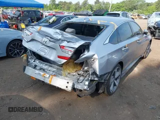 2020 Honda Accord Touring z VIN 1HGCV2F93LA017701, wystawiony jako IAAI lot #42383938 z przebiegiem 40 945 mil mil oraz . Historia ofert i sprzedaży dostępna na DreamBid. Obrazek 6.
