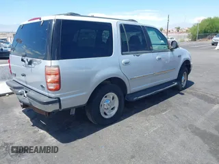 1999 Ford Expedition XLT z VIN 1FMPU18L8XLA69627, wystawiony jako IAAI lot #42847569 z przebiegiem Nie podano mil oraz . Historia ofert i sprzedaży dostępna na DreamBid. Obrazek 4.