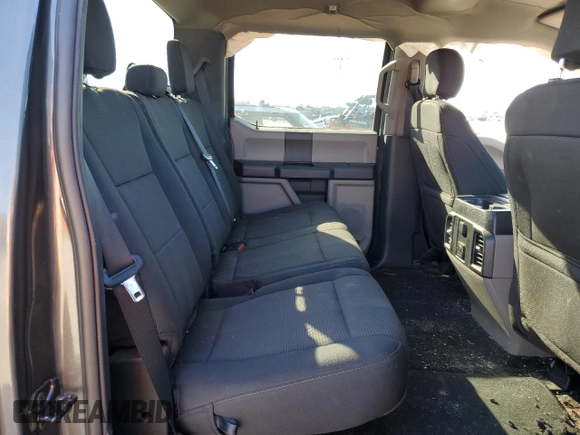 2020 Ford F-150 XL with VIN 1FTEW1CPXLKD42809, listed as a Copart auction lot 87208204 with 104,049 mi miles and Salvage Title. Bid and sale history available at carsss.com. Image 10.