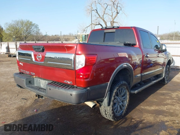 2017 Nissan Titan Pro-4X z VIN 1N6BA1F43HN562377, wystawiony jako IAAI lot #41786607 z przebiegiem 95 207 mil mil oraz . Historia ofert i sprzedaży dostępna na DreamBid. Obrazek 4.
