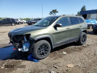 2020 Jeep Cherokee Trailhawk z VIN 1C4PJMBX6LD614030, wystawiony jako Copart lot #56032145 z przebiegiem 38 263 mil mil oraz Szkoda całkowita • Salvage title. Historia ofert i sprzedaży dostępna na DreamBid. Obrazek 1.