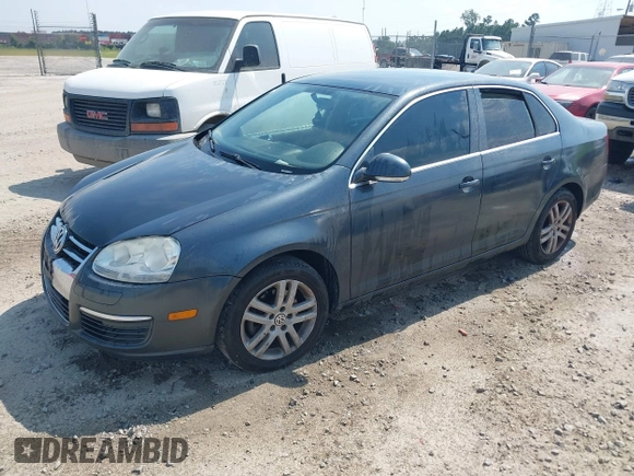 2007 Volkswagen Jetta 2.5 z VIN 3VWRF71K67M131095, wystawiony jako IAAI lot #42561971 z przebiegiem 127 592 mil mil oraz . Historia ofert i sprzedaży dostępna na DreamBid. Obrazek 2.