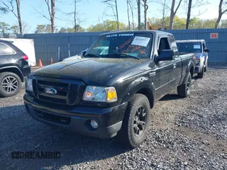 2011 Ford Ranger XLT with VIN 1FTLR4FE9BPB07796, listed as a IAAI auction lot 42128597 with 235,512 mi miles. Bid and sale history available at carsss.com. Image 18.