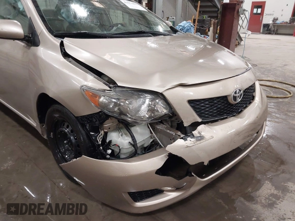 2009 Toyota Corolla with VIN 1NXBU40E19Z014460, listed as a IAAI auction lot 41973023 with 74,927 mi miles. Bid and sale history available at carsss.com. Image 6.