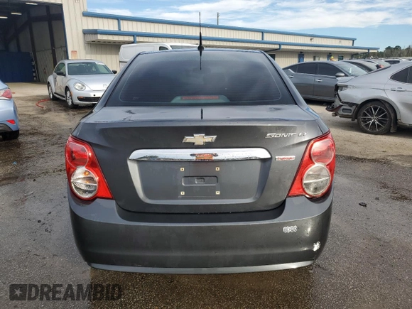 2012 Chevrolet Sonic LT z VIN 1G1JD5SB5C4218560, wystawiony jako Copart lot #75256184 z przebiegiem 182 339 mil mil oraz Szkoda całkowita • Salvage title. Historia ofert i sprzedaży dostępna na DreamBid. Obrazek 6.