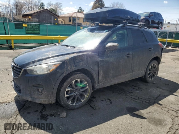 2016 Mazda CX-5 Grand Touring with VIN JM3KE4DYXG0730145, listed as a Copart auction lot 51666535 with 117,677 mi miles and Salvage Title. Bid and sale history available at carsss.com. Image 1.