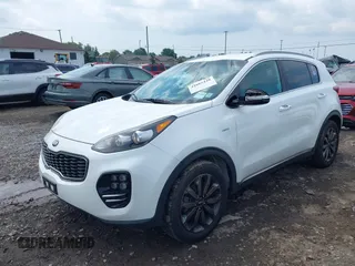 2018 Kia Sportage EX with VIN KNDPNCACXJ7409142, listed as a IAAI auction lot 42665448 with 80,537 mi miles and . Bid and sale history available at DreamBid. Image 19.