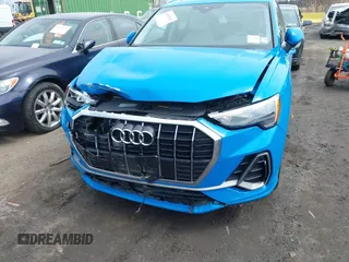 2020 Audi Q3 S line Premium z VIN WA1DECF39L1013425, wystawiony jako IAAI lot #41851042 z przebiegiem 57 901 mil mil oraz . Historia ofert i sprzedaży dostępna na DreamBid. Obrazek 21.
