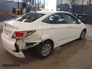 2015 Hyundai Accent GLS with VIN KMHCT4AE8FU876771, listed as a IAAI auction lot 42007229 with 63,484 mi miles. Bid and sale history available at carsss.com. Image 4.