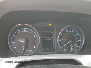 2018 Toyota RAV4 XLE with VIN 2T3WFREV4JW444884, listed as a Copart auction lot 55666275 with 174,275 mi miles and Salvage Title. Bid and sale history available at DreamBid. Image 9.