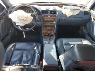 1996 Mercedes-Benz C with VIN WDBHA28E5TF406948, listed as a Copart auction lot 80234944 with 239,256 mi miles and Salvage Title. Bid and sale history available at carsss.com. Image 8.