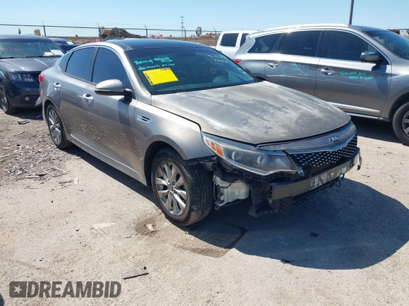 2016 Kia Optima EX with VIN 5XXGU4L31GG106854, listed as a IAAI auction lot 41762052 with 122,121 mi miles. Bid and sale history available at carsss.com. Image 1.
