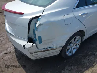 2016 Cadillac ATS Standard RWD with VIN 1G6AA5RA4G0110279, listed as a IAAI auction lot 42078659 with 72,085 mi miles and . Bid and sale history available at DreamBid. Image 6.