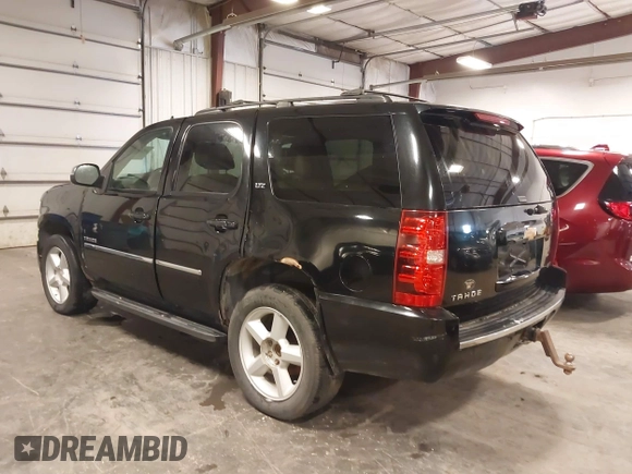 2012 Chevrolet Tahoe LTZ with VIN 1GNSKCE02CR297261, listed as a IAAI auction lot 40255137 with 283,110 mi miles and . Bid and sale history available at DreamBid. Image 3.