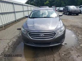 2014 Ford Taurus Limited with VIN 1FAHP2F84EG149622, listed as a Copart auction lot 63764675 with 208,801 mi miles and Salvage title. Bid and sale history available at DreamBid. Image 5.