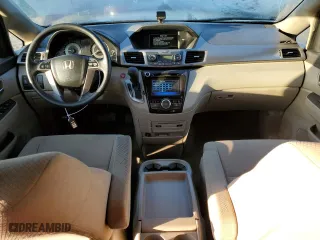 2016 Honda Odyssey SE with VIN 5FNRL5H38GB129450, listed as a Copart auction lot 49069535 with 70,621 mi miles and Salvage Title. Bid and sale history available at carsss.com. Image 8.