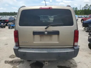 2007 Dodge Nitro SXT z VIN 1D8GT28KX7W596489, wystawiony jako Copart lot #56151355 z przebiegiem 295 949 mil mil oraz Szkoda całkowita • Salvage title. Historia ofert i sprzedaży dostępna na DreamBid. Obrazek 6.