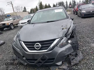 2017 Nissan Altima SV with VIN 1N4AL3AP3HC489387, listed as a IAAI auction lot 41665718 with 65,873 mi miles and . Bid and sale history available at DreamBid. Image 12.