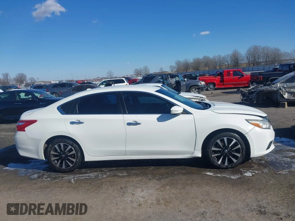 2018 Nissan Altima S with VIN 1N4AL3AP9JC181033, listed as a IAAI auction lot 41400570 with 198,928 mi miles and . Bid and sale history available at carsss.com. Image 13.