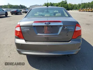 2010 Ford Fusion Hybrid z VIN 3FADP0L33AR267806, wystawiony jako Copart lot #55952815 z przebiegiem 146 912 mil mil oraz Szkoda całkowita • Salvage title. Historia ofert i sprzedaży dostępna na DreamBid. Obrazek 6.