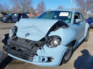 2014 Volkswagen Beetle 2.5L w/Sun with VIN 3VWJP7AT6EM601318, listed as a IAAI auction lot 41902598 with 169,220 mi miles and . Bid and sale history available at DreamBid. Image 17.