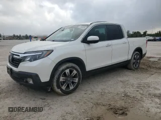 2017 Honda Ridgeline RTL-T with VIN 5FPYK2F64HB003413, listed as a Copart auction lot 51828525 with 76,762 mi miles and Clean title. Bid and sale history available at DreamBid. Image 1.