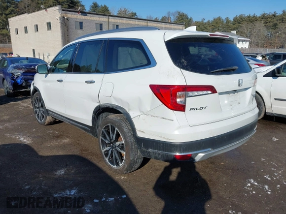 2020 Honda Pilot Elite with VIN 5FNYF6H09LB039247, listed as a IAAI auction lot 41364383 with 56,865 mi miles and . Bid and sale history available at DreamBid. Image 3.